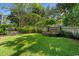 Lush backyard featuring a fountain, manicured hedges, and a stone pathway at 201 Broad St., Georgetown, SC 29440