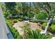 Bird's eye view of a landscaped patio area offering a serene outdoor living space in a well-maintained yard at 201 Broad St., Georgetown, SC 29440