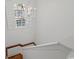 Bright staircase with chandelier and view from a window at 201 Broad St., Georgetown, SC 29440