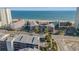 Aerial view of a condo complex near the beach with a pool between buildings and a street in front of the building at 210 North Ocean Blvd. # 330, North Myrtle Beach, SC 29582