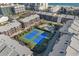 Aerial view of condo community with tennis courts and a pool at 210 North Ocean Blvd. # 330, North Myrtle Beach, SC 29582