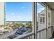 Balcony view of the beach and parking area at 210 North Ocean Blvd. # 330, North Myrtle Beach, SC 29582