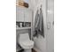 Bathroom featuring a toilet, cabinet, decorative towels, and a glass-enclosed shower at 210 North Ocean Blvd. # 330, North Myrtle Beach, SC 29582