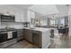 Modern kitchen with stainless steel appliances and granite countertops at 210 North Ocean Blvd. # 330, North Myrtle Beach, SC 29582