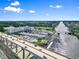 Aerial view of the water surrounded by trees, a bridge, and buildings under the sky at 2100 Sea Mountain Hwy. # 122, North Myrtle Beach, SC 29582