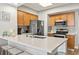 Close-up of the kitchen with stainless steel appliances and ample counter space at 2100 Sea Mountain Hwy. # 122, North Myrtle Beach, SC 29582