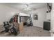 Functional bedroom featuring a loft bed, ceiling fan, and exercise bike at 218 Landing Rd. # G, North Myrtle Beach, SC 29582