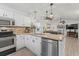 Modern kitchen featuring stainless steel appliances, granite counters, and a breakfast bar at 218 Landing Rd. # G, North Myrtle Beach, SC 29582