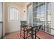 Relaxing balcony setup with outdoor seating and an orange patterned rug, providing a comfortable outdoor space at 2241 Waterview Dr. # 527, North Myrtle Beach, SC 29582