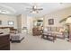 Cozy living room with a ceiling fan, comfortable furniture, and a view of the condo's breakfast bar at 2241 Waterview Dr. # 527, North Myrtle Beach, SC 29582