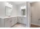 Bathroom with double vanity, white cabinets, and modern fixtures at 227 Walnut Grove Ct., Myrtle Beach, SC 29579