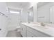 Bright bathroom with double sinks, a bathtub, and white cabinets at 227 Walnut Grove Ct., Myrtle Beach, SC 29579