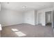 Carpeted bedroom featuring a double closet and access to other rooms at 227 Walnut Grove Ct., Myrtle Beach, SC 29579