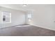 Bedroom bathed in light from the two windows and featuring neutral carpet at 227 Walnut Grove Ct., Myrtle Beach, SC 29579