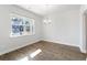 Dining room with hardwood floors and a window providing natural light at 227 Walnut Grove Ct., Myrtle Beach, SC 29579