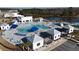 Aerial shot of community pool area with seating, umbrellas, and landscaping at 227 Walnut Grove Ct., Myrtle Beach, SC 29579