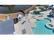 Aerial view showcases the pool with lazy river and sunbathing areas at 227 Walnut Grove Ct., Myrtle Beach, SC 29579