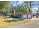 Brick home with attached two car garage and palm tree at 268 Wraggs Ferry Rd., Georgetown, SC 29440