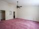 Bright bedroom featuring an overhead fan, ensuite bathroom, and closet at 300 19Th Ave. S, Myrtle Beach, SC 29577