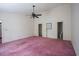 Spacious bedroom featuring an overhead fan and ensuite bathroom access at 300 19Th Ave. S, Myrtle Beach, SC 29577