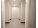 Hallway featuring geometric tiled floor and changing rooms at 300 19Th Ave. S, Myrtle Beach, SC 29577