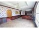 Spacious kitchen and dining area with wood cabinets and patterned wallpaper at 300 19Th Ave. S, Myrtle Beach, SC 29577