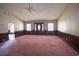 Spacious living room featuring wainscoting, chandelier lighting and multiple windows at 300 19Th Ave. S, Myrtle Beach, SC 29577