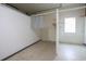 Neutral room featuring laminate floors, bright window and wire rack storage at 300 19Th Ave. S, Myrtle Beach, SC 29577