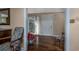 Inviting foyer with hardwood floors, a white front door, chair seating, and a window offering natural light at 304 Queens Rd., Myrtle Beach, SC 29572