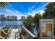 Picturesque view of the lake with the buildings in the background on a clear day at 304 Queens Rd., Myrtle Beach, SC 29572