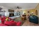 Bright living room with a fireplace, built-in bookshelves, comfortable furnishings, and plenty of natural light at 304 Queens Rd., Myrtle Beach, SC 29572