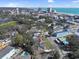 Expansive aerial view of a coastal community showcasing lush greenery, nearby beaches, and stunning ocean views at 306 Oak Lake Circle, North Myrtle Beach, SC 29582