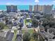 A panoramic view showcases a coastal community with nearby beaches, condominiums, and neighborhood swimming pool at 306 Oak Lake Circle, North Myrtle Beach, SC 29582