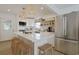 Modern kitchen with a large island, stainless steel appliances, and white cabinets at 306 Oak Lake Circle, North Myrtle Beach, SC 29582