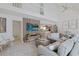 Bright living room with a vaulted ceiling, wood accent wall and a comfortable sectional sofa at 306 Oak Lake Circle, North Myrtle Beach, SC 29582