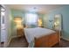 Tranquil beach-themed bedroom featuring a queen bed and decorative accents at 314 58Th Ave. N, North Myrtle Beach, SC 29582