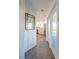 Hallway view to the bright kitchen with stainless steel appliances and an open concept design at 314 58Th Ave. N, North Myrtle Beach, SC 29582