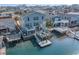 Aerial view of a waterfront home featuring multi-level decks and water access at 323 45Th Ave. N, North Myrtle Beach, SC 29582