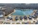 Aerial view of the neighborhood with pond showcasing housing and landscaping in a lovely community at 325 High Falls Dr., Conway, SC 29526