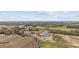 Aerial view of the home near a pond in a peaceful rural setting at 3372 Gurley Rd., Loris, SC 29569