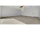 Spacious garage with concrete floor, neutral walls, and multiple entry doors allowing for vehicle storage at 3372 Gurley Rd., Loris, SC 29569