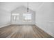 Bright living room with large windows and wainscoting detail with views of the front yard at 3372 Gurley Rd., Loris, SC 29569