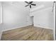 Empty main bedroom featuring a tray ceiling and ceiling fan at 3372 Gurley Rd., Loris, SC 29569