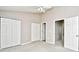 Bedroom with neutral walls, carpeted flooring, and white closet doors at 3506 Evergreen Way # 3506, Myrtle Beach, SC 29577