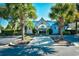 Attractive community clubhouse framed by palm trees and lush landscaping at 3506 Evergreen Way # 3506, Myrtle Beach, SC 29577