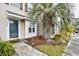 Charming entrance with palm tree, walkway, and meticulously maintained landscaping for a welcoming ambiance at 3506 Evergreen Way # 3506, Myrtle Beach, SC 29577