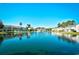 Scenic view of the pond and surrounding community under a clear blue sky at 3506 Evergreen Way # 3506, Myrtle Beach, SC 29577