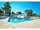 Beautiful community pool with white fences, umbrellas and blue roofs at 3506 Evergreen Way # 3506, Myrtle Beach, SC 29577