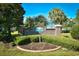 Entrance to Windsor Gate community with brick sign and lush landscaping creating an inviting atmosphere at 3506 Evergreen Way # 3506, Myrtle Beach, SC 29577