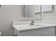 Bathroom vanity with white countertop, sink, and mirror at 4161 Hibiscus Dr. # 15-302, Little River, SC 29566